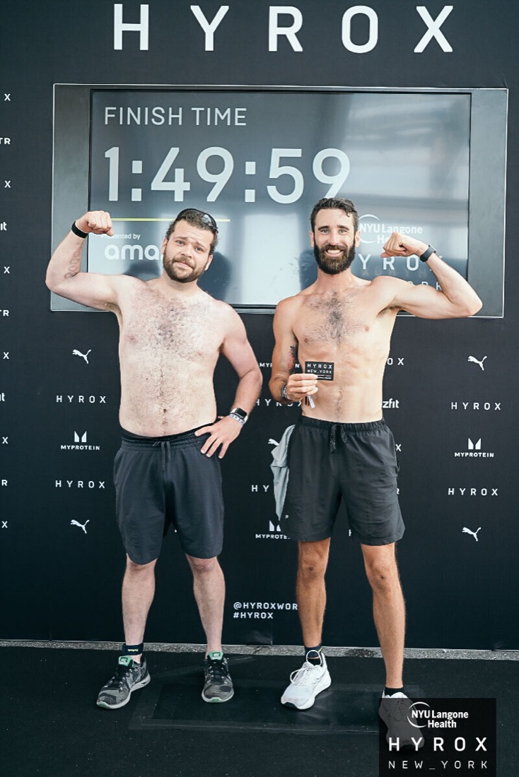 Heathrow and Justin finishing HYROX New York at 1:49:59